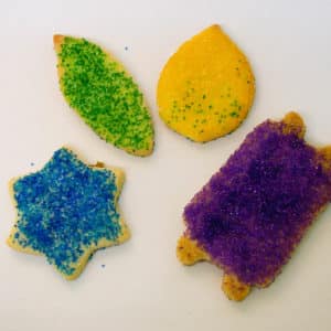 Sukkot Rolled Sugar Cookies (including blue Star of David, green willow leaf, yellow etrog, and purple Torah)