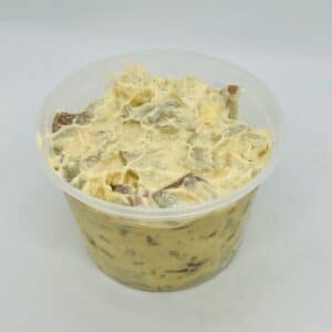 Deli container filled with potato salad.